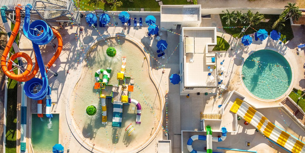 Overhead aerial view of a kids splash park with slides