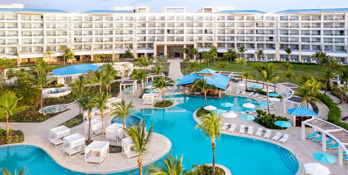 Aerial shot of a resort pool and building