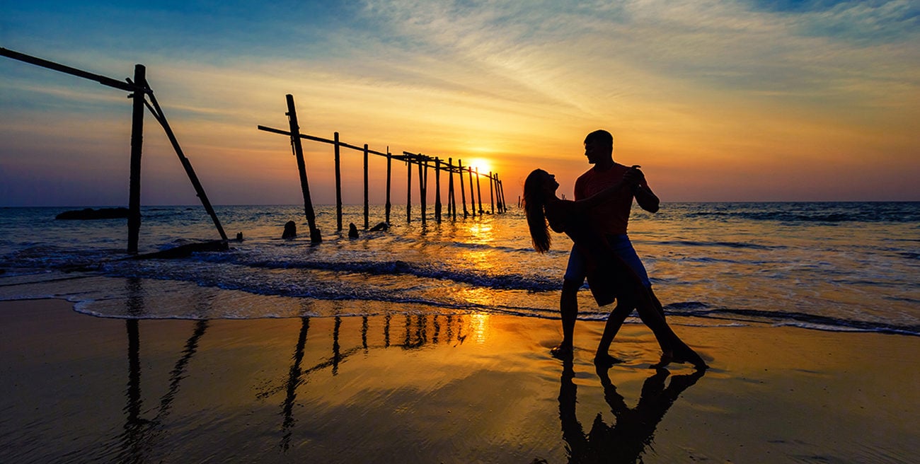 Silhouette of a couple at sunset on a beach