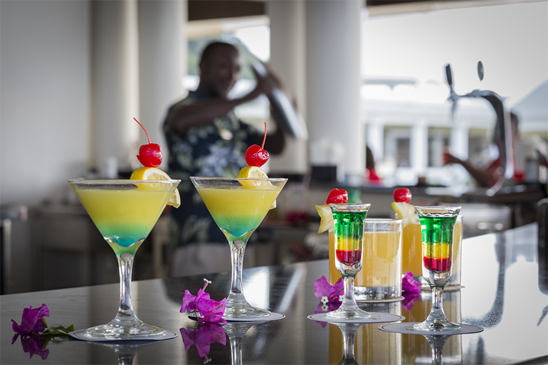 The Bob Marley cocktail and other mixed drinks on a bar counter at Grand Palladium Jamaica Resort & Spa