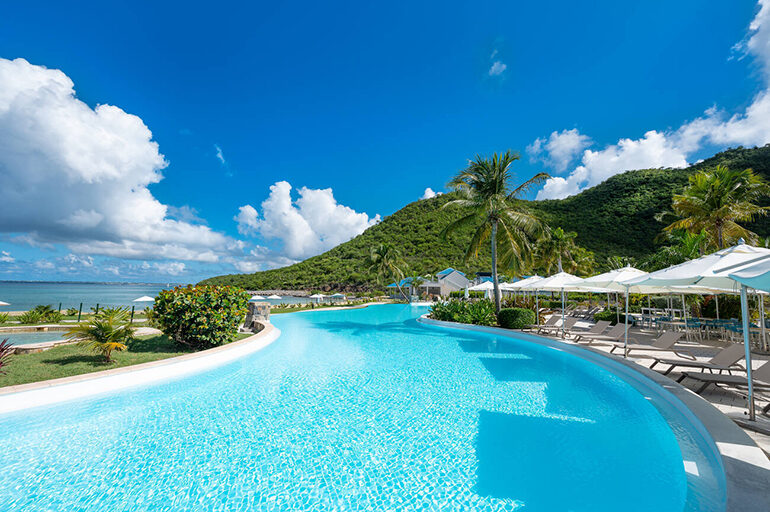 A long infinity pool at a resort in St Martin