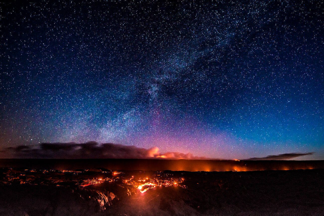 Magma under a starry sky at Hawaii Volcanoes National Park.