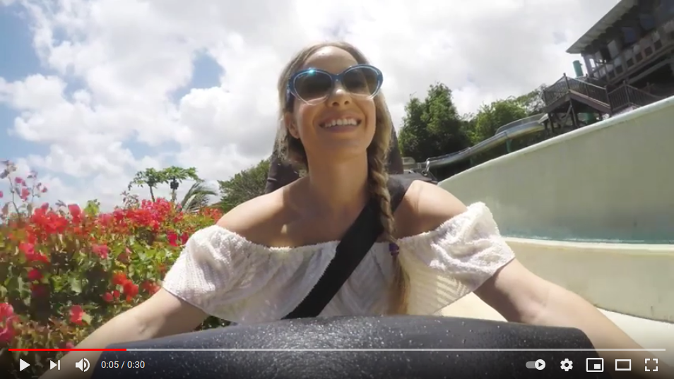 Woman riding a Jamaican bobsled ride