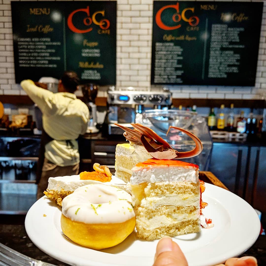 Coffee shop with array of cakes