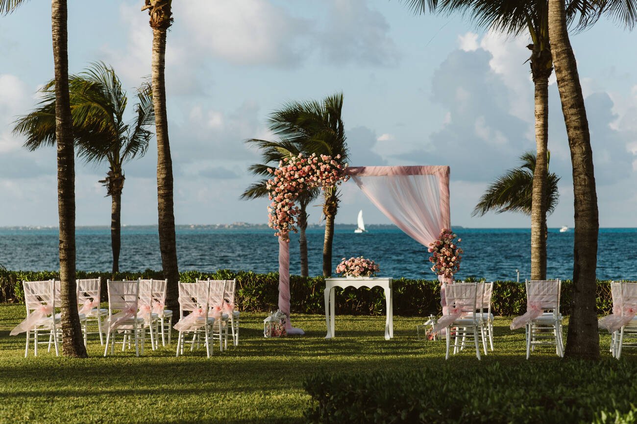 Wedding ceremony set up by the ocean