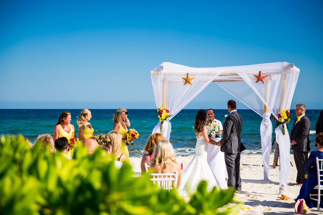 Beach wedding taking place