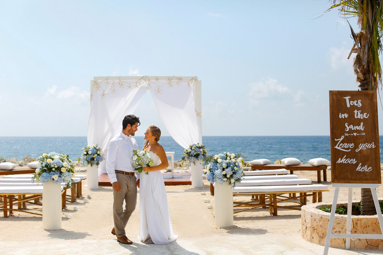 Bride and groom together on the aisle