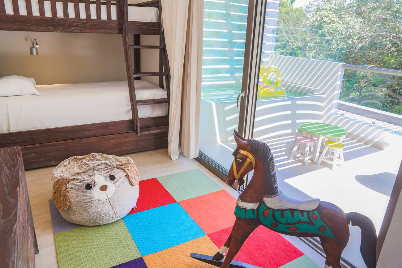 Hotel room with bunk beds and toys