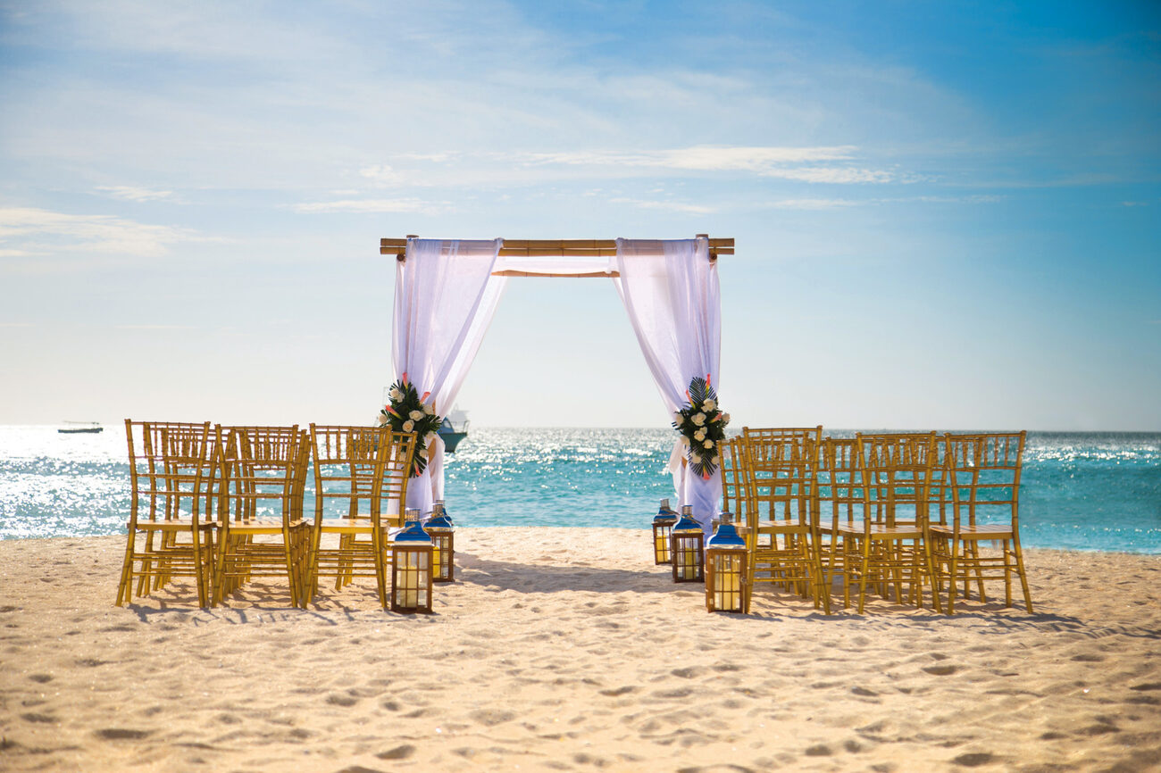 Beach wedding ceremony and alter set up