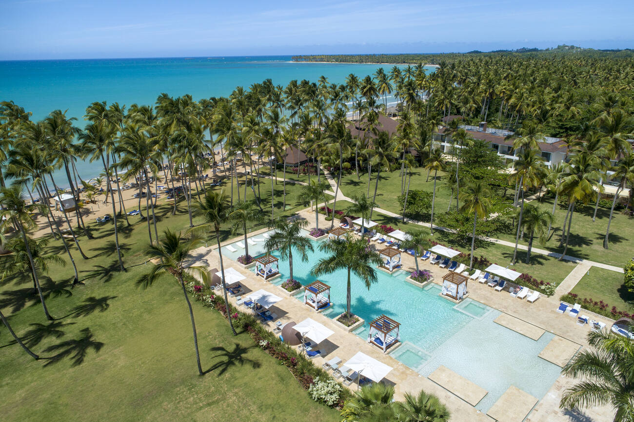 Balcony view of hotel pools and the beach