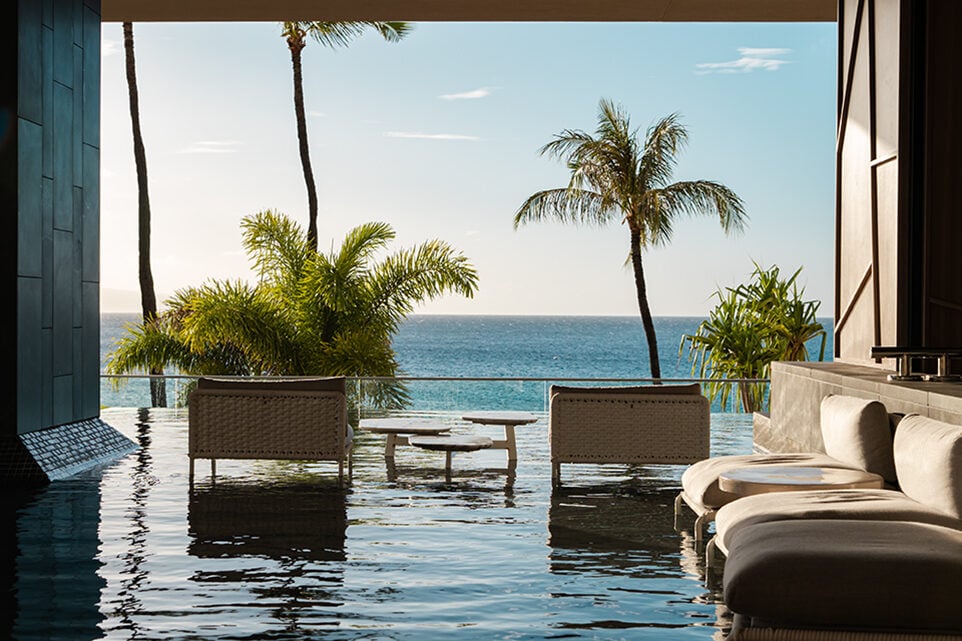 Tables and chairs in the balcony pool