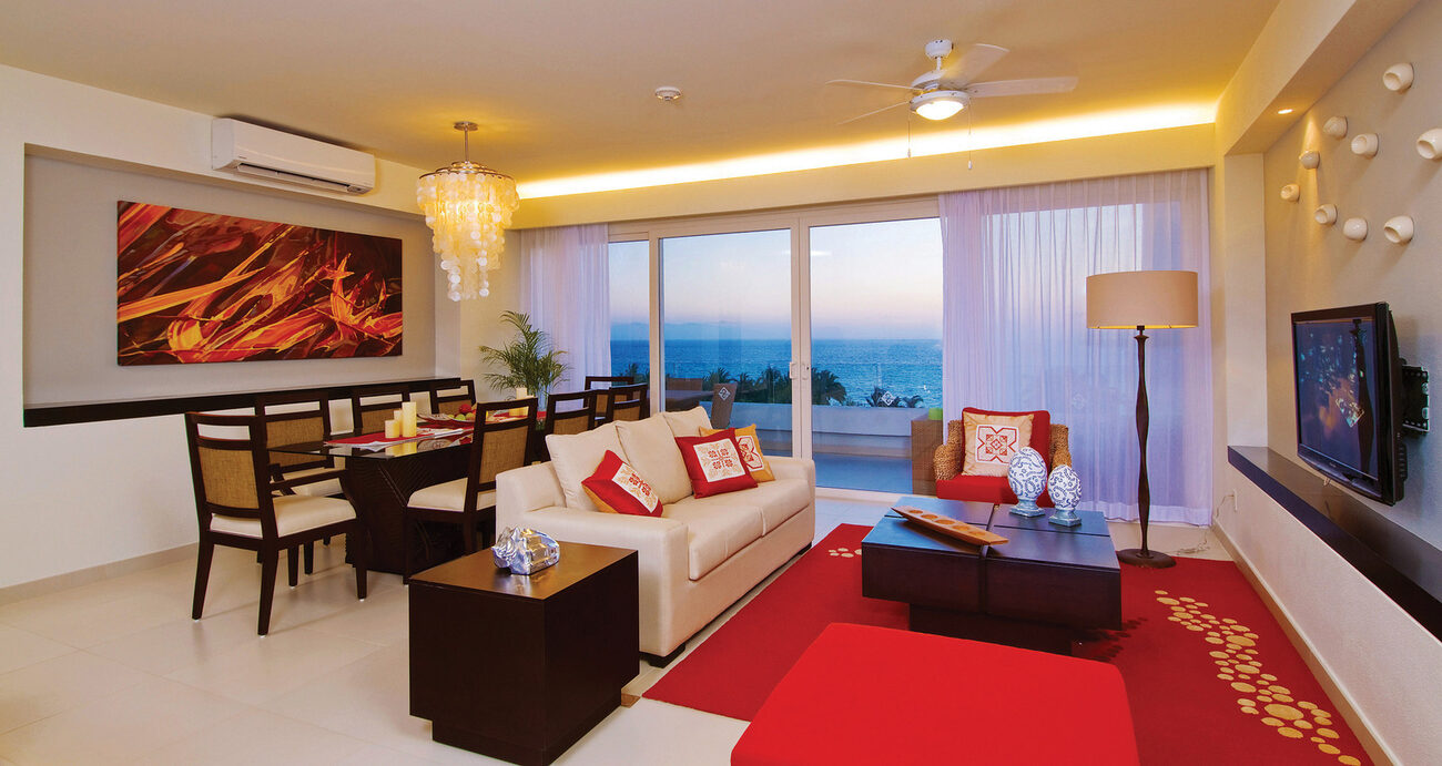 Living and dining room with view of the ocean