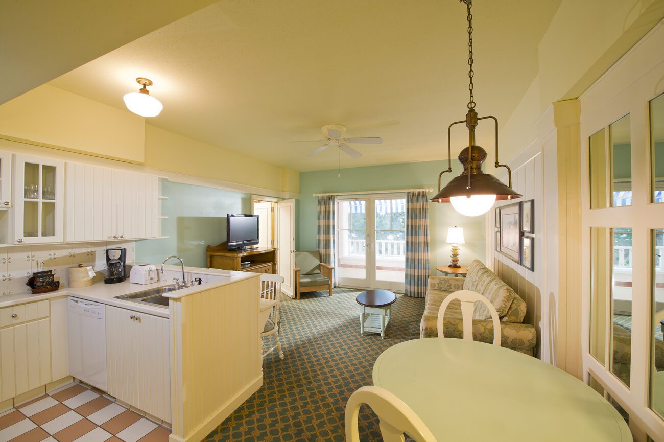 Kitchen and living area with view of the balcony