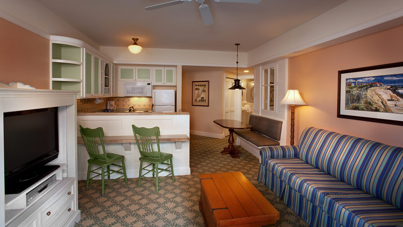 View of living area, kitchen, and bathroom