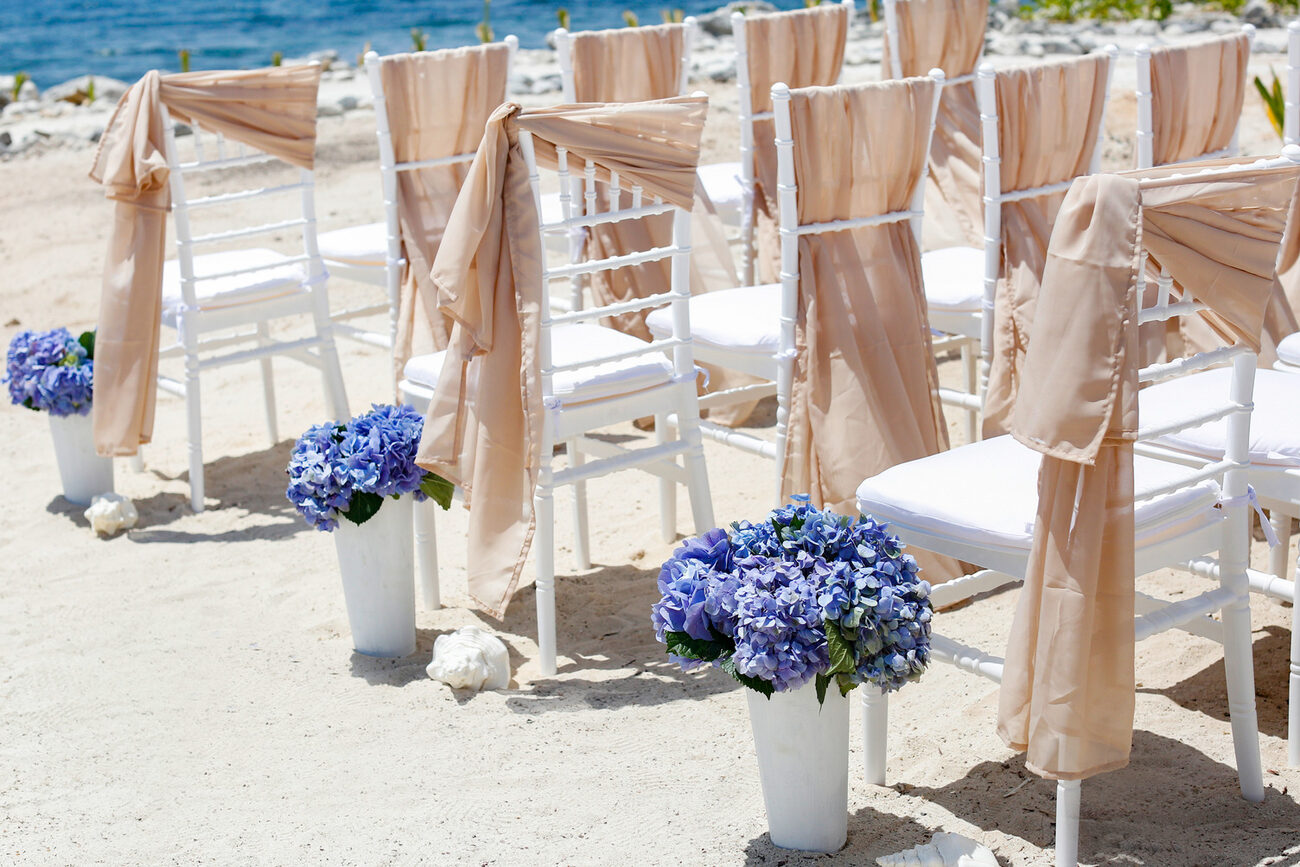 Wedding ceremony chairs set up on the beach