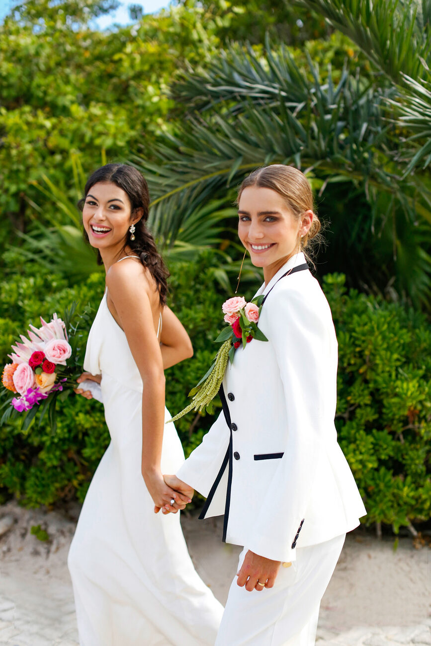 Brides holding hands