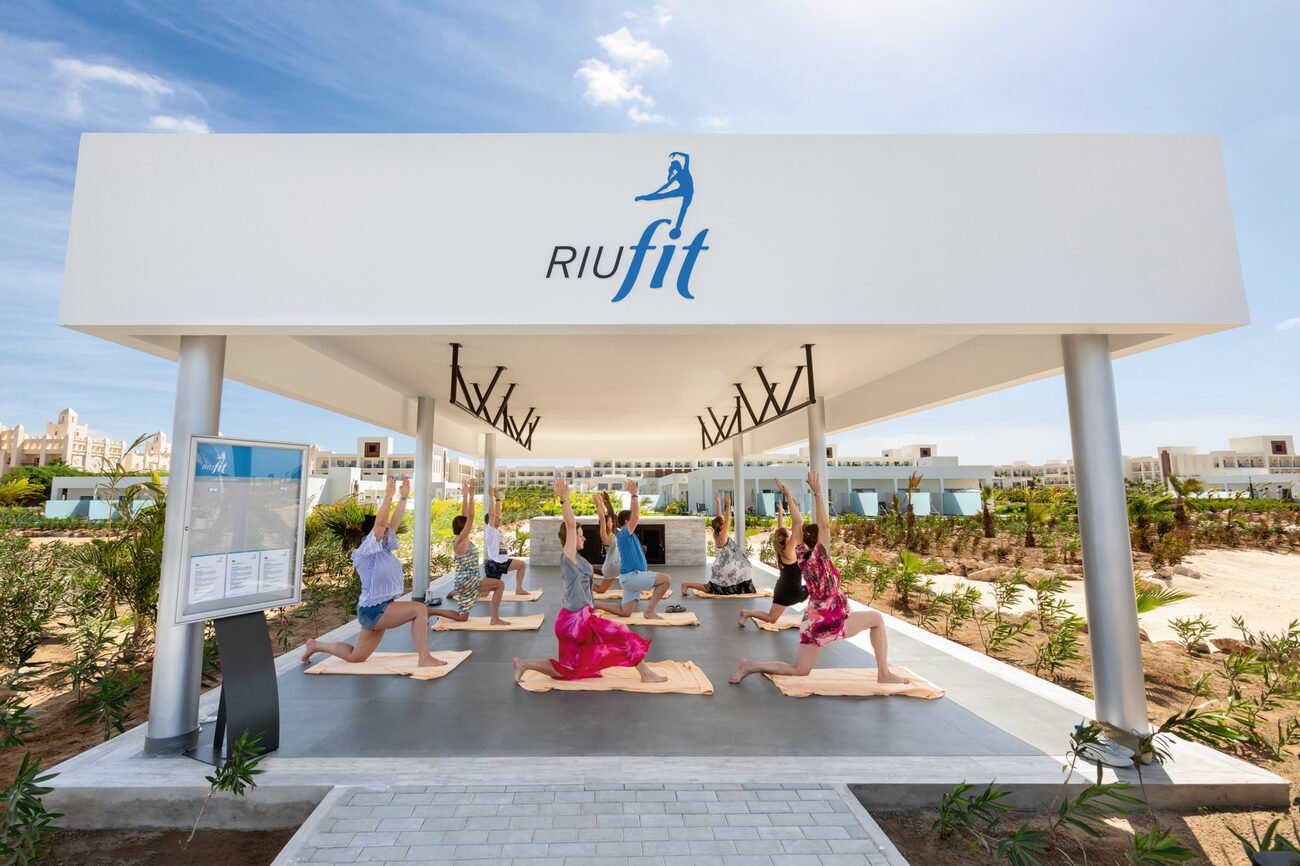 Group doing outdoor yoga