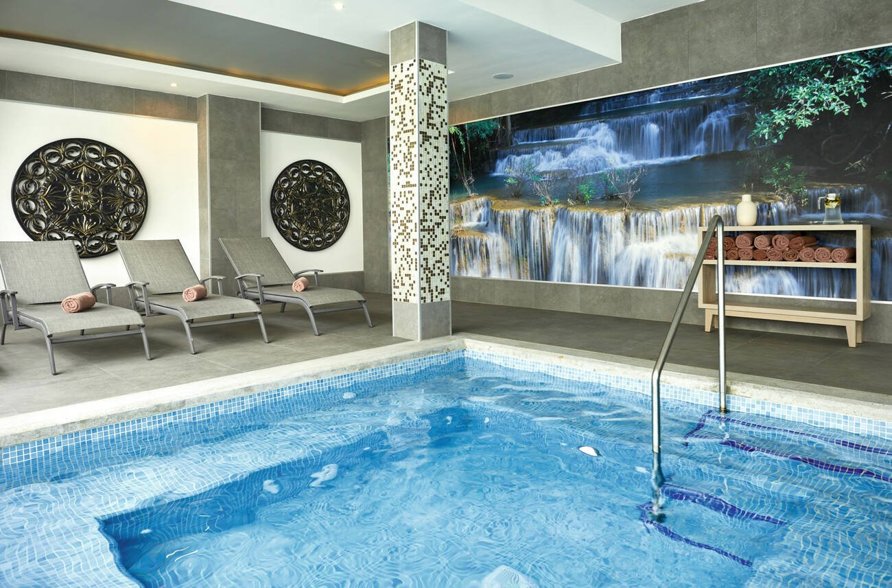 Indoor lounge chairs and pool