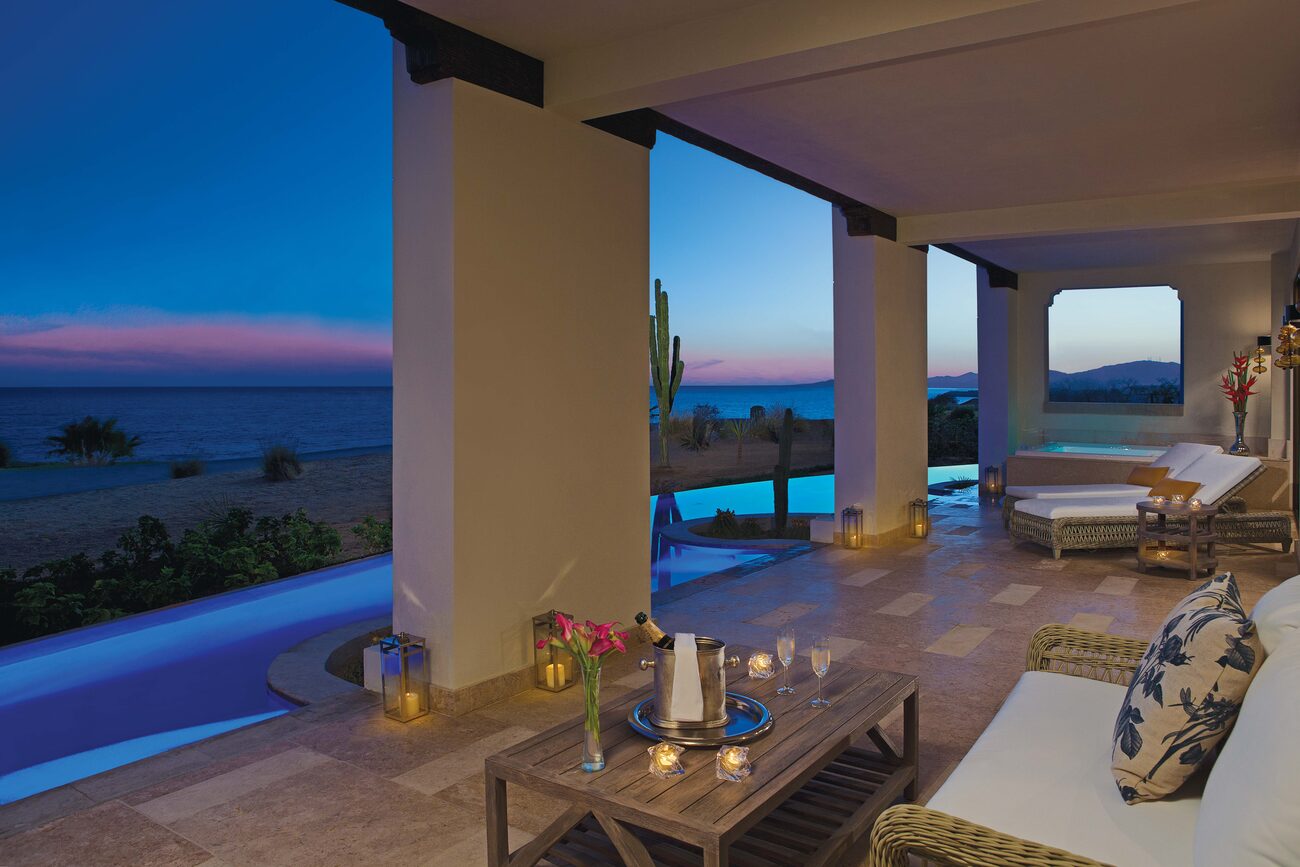 Candlelit table with champagne overlooking the ocean