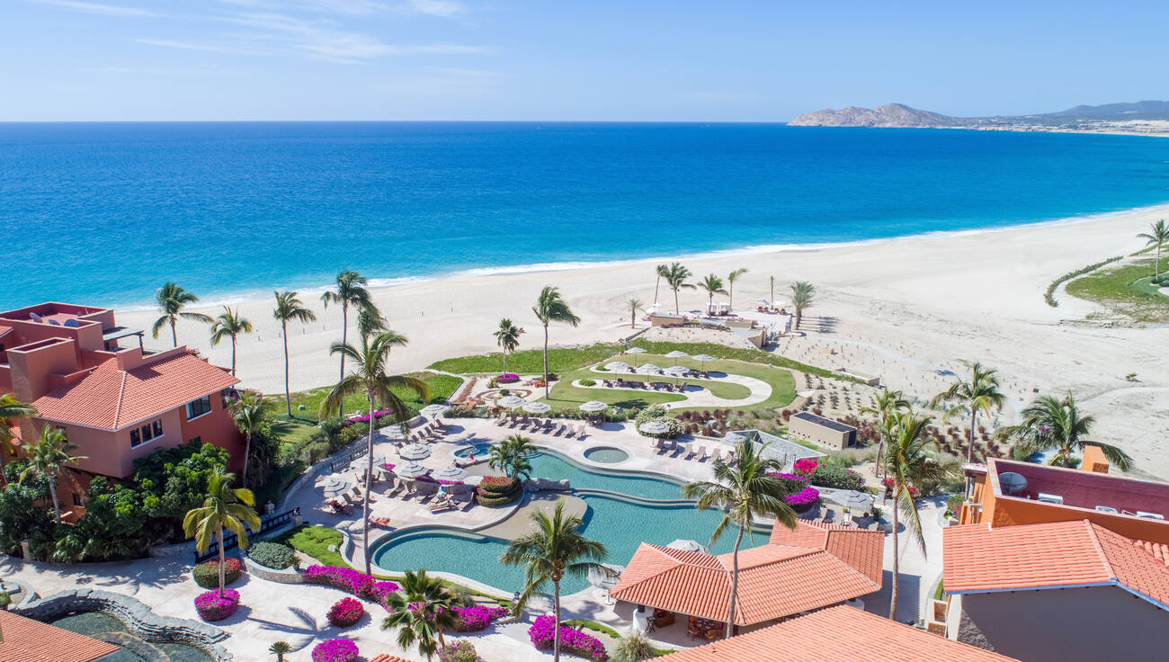 View of buildings, pools, and the beach