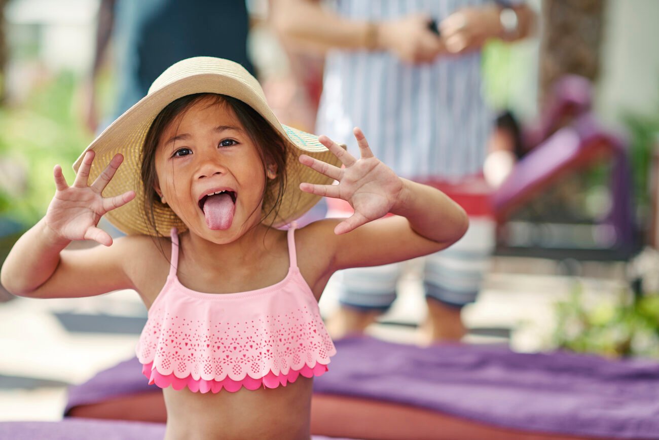 Little girl posing with a silly face