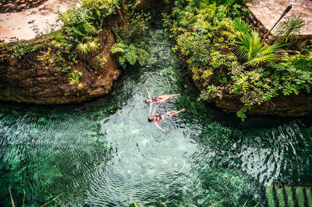 Two people floating in water