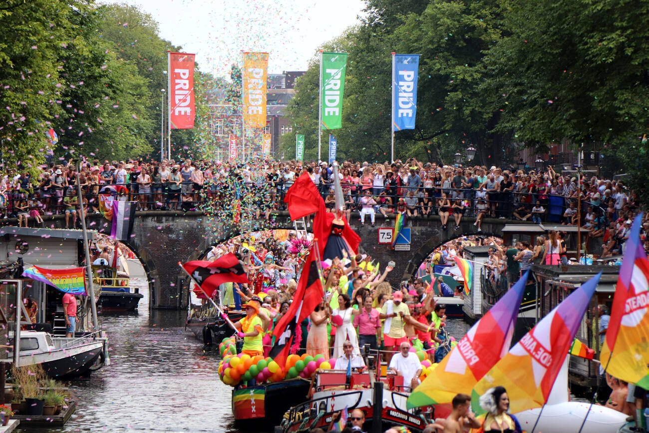 People on a float in a pride parade