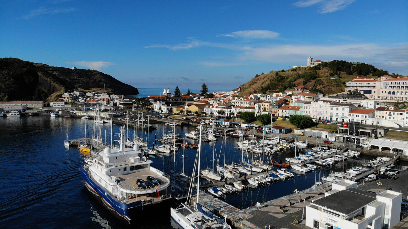 Boats parked at a marina 