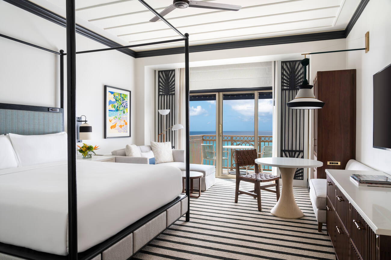 Bedroom with deck and ocean view