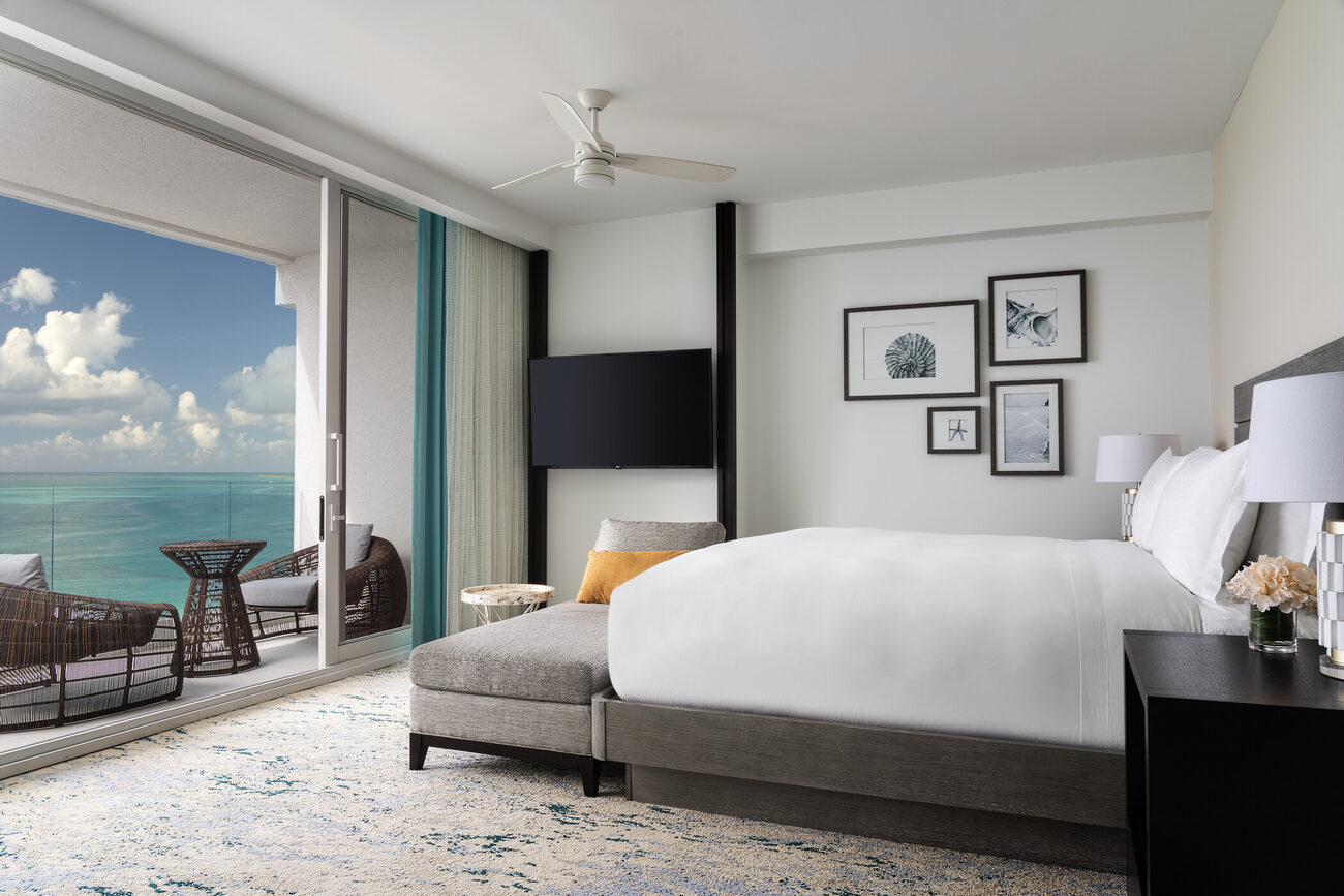 Bedroom with bed facing the ocean view