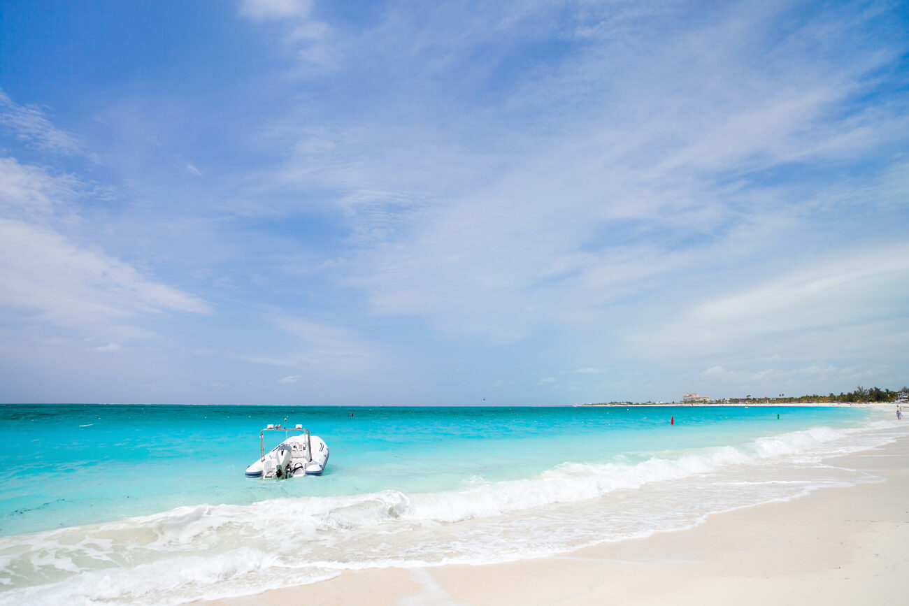 Beach with one boat near shore