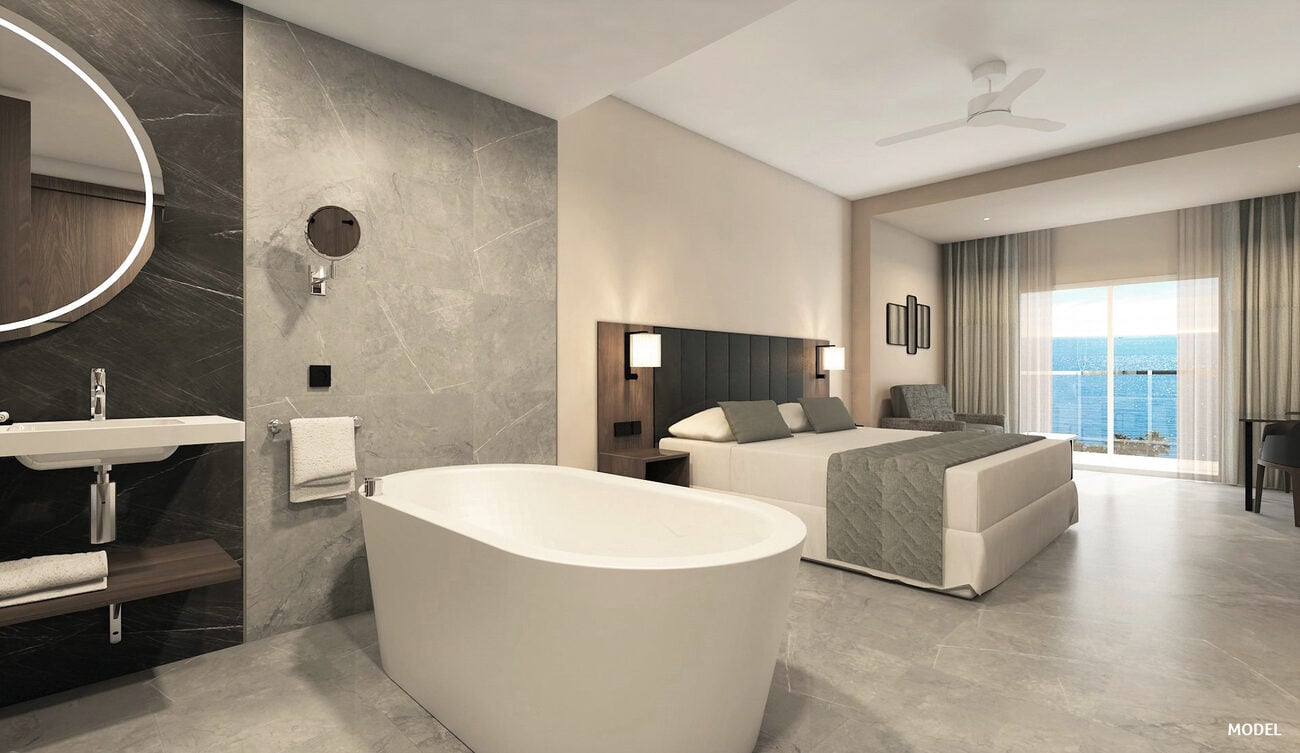 Bathroom with marble walls and bathtub