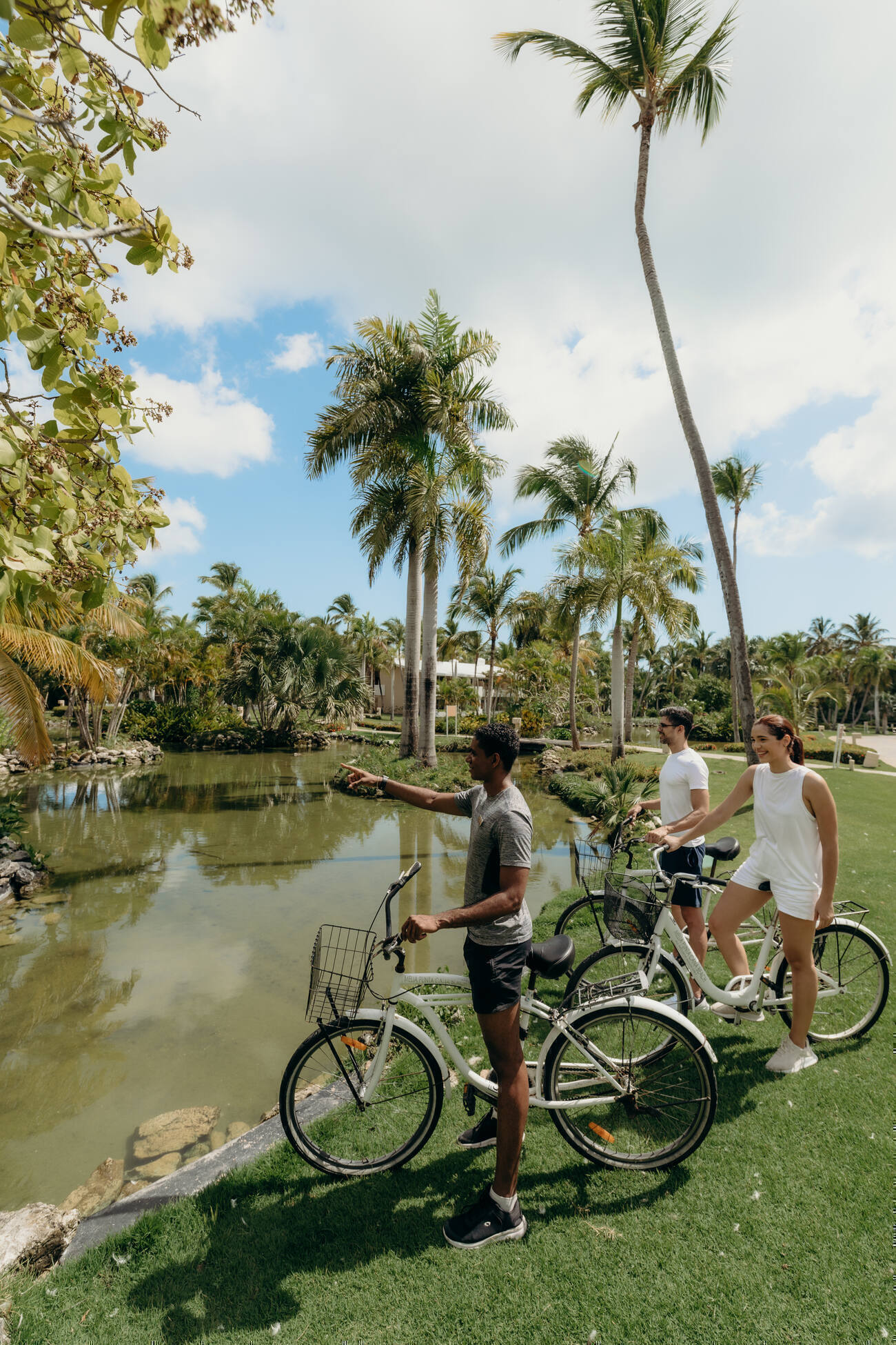 Man looking out on water on his bike