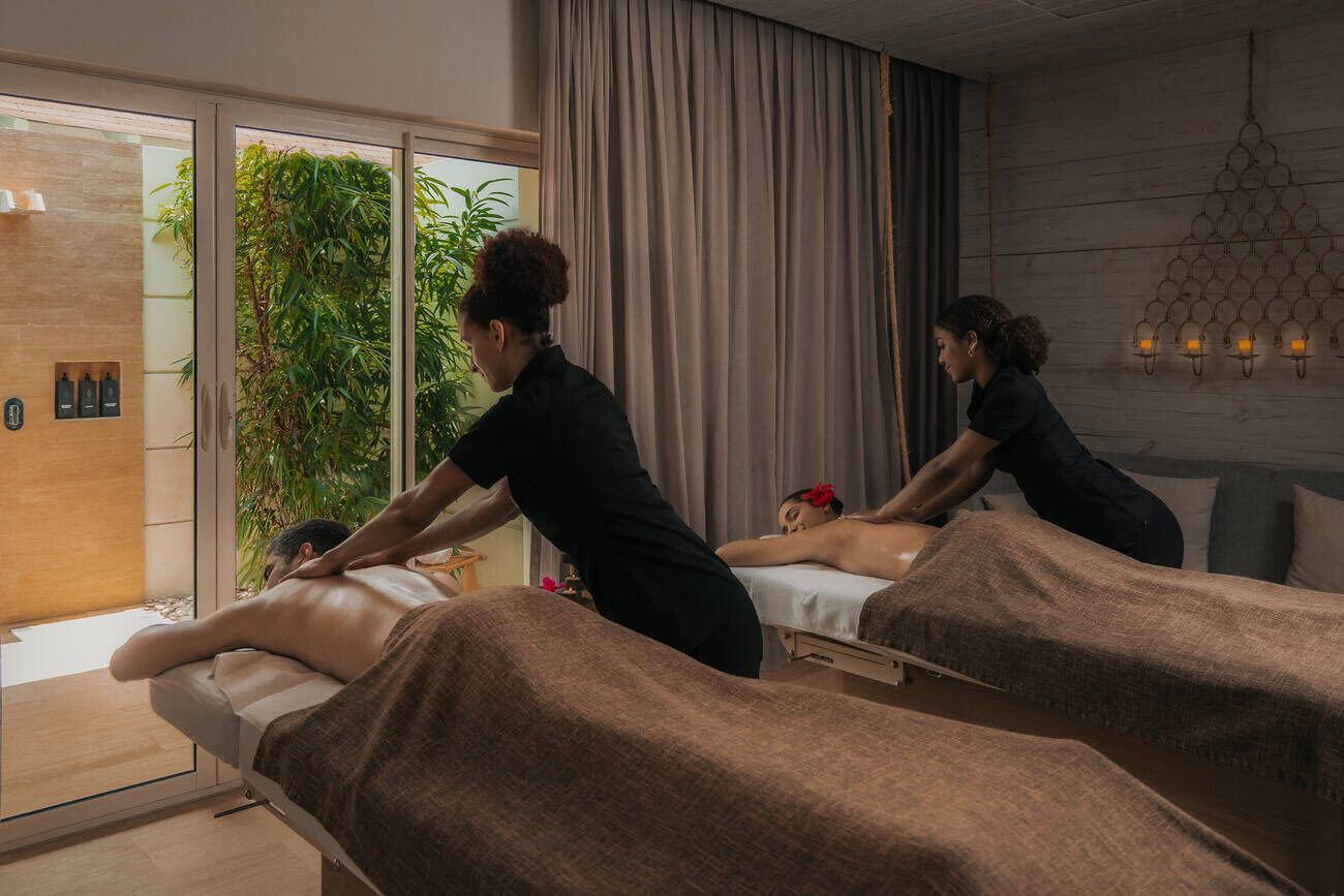 Couple receiving massages