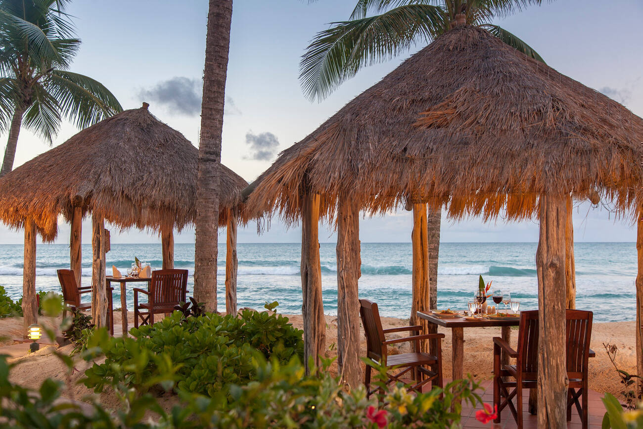 Galley Bay Resort and Spa dinner table by the water