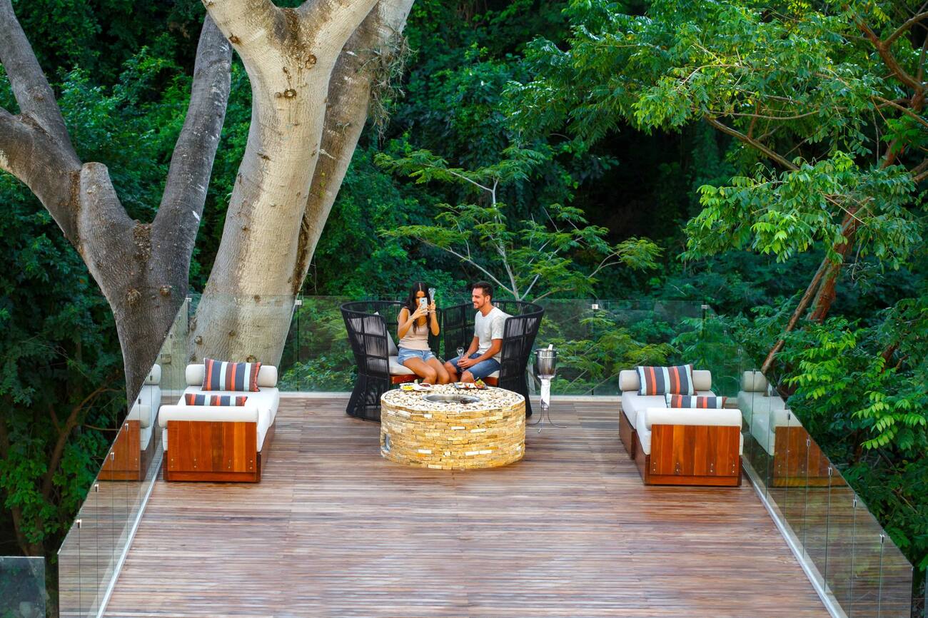 Couple having drinks on a deck