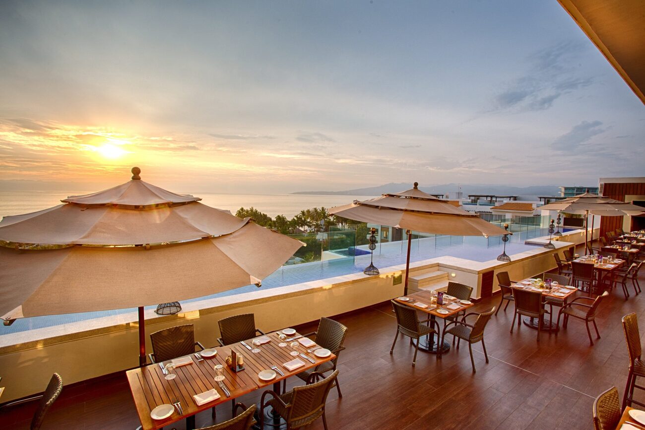 Dinner tables facing the sunset